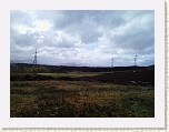 20150511_153451 * A mix of rough ground, snowy distant hills, and power lines. * 2048 x 1536 * (1.15MB)